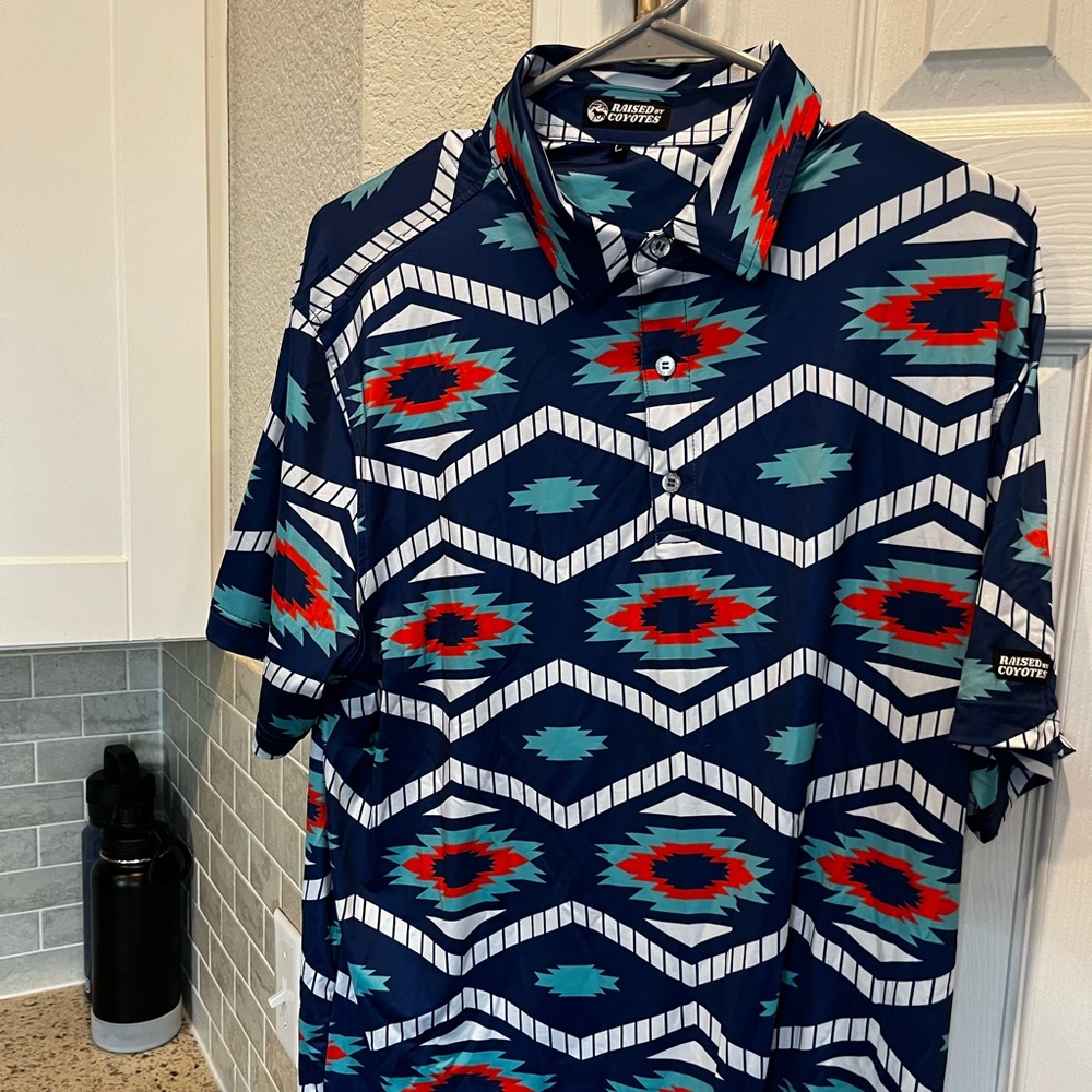 LG- Raised By Coyotes golf shirt